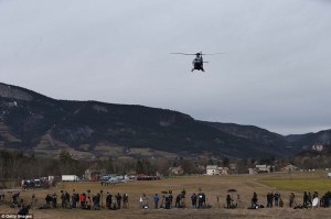 26F878DB00000578-3010610-Reporters_and_television_crews_gather_near_where_French_police_a-a-12_1427318130175