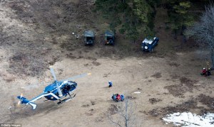 26FC3C4400000578-3010610-Base_Search_and_rescue_teams_are_seen_being_dropped_near_the_cra-a-25_1427318141213